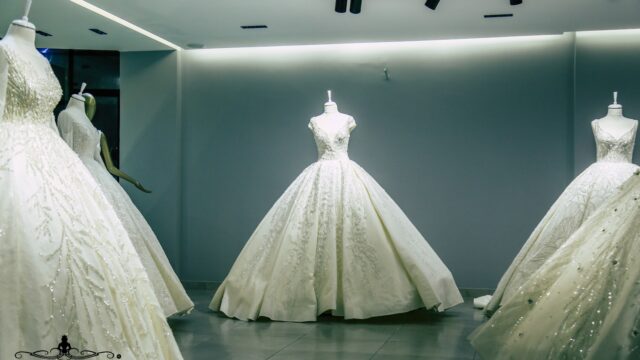 a group of dresses in a room