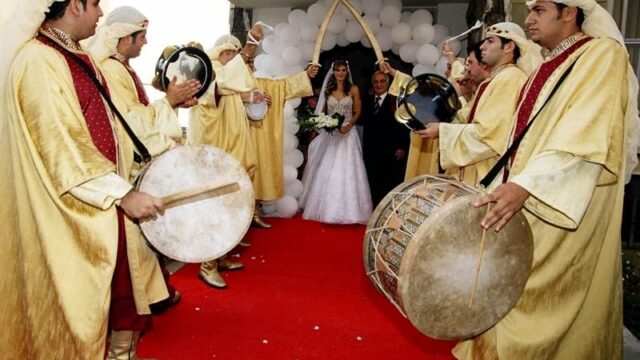 a group of people playing drums