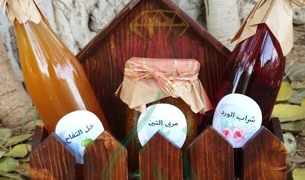 a group of bottles in a wooden box