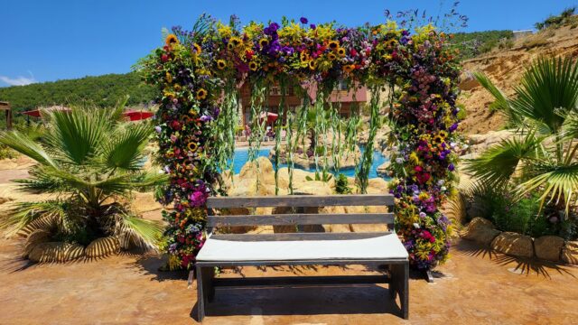 a bench with flowers on it