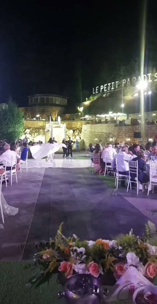 a group of people at a wedding