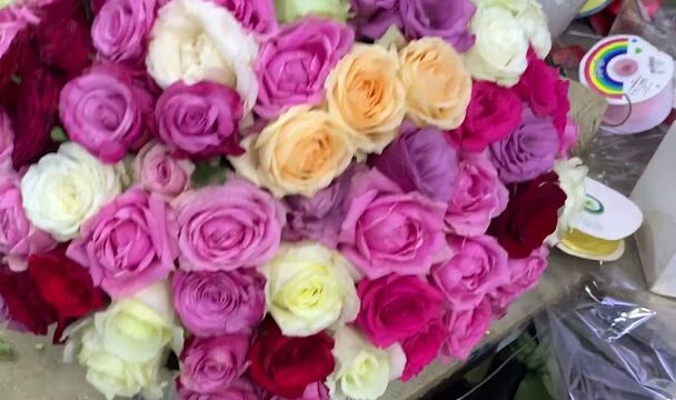 a bunch of roses on a table