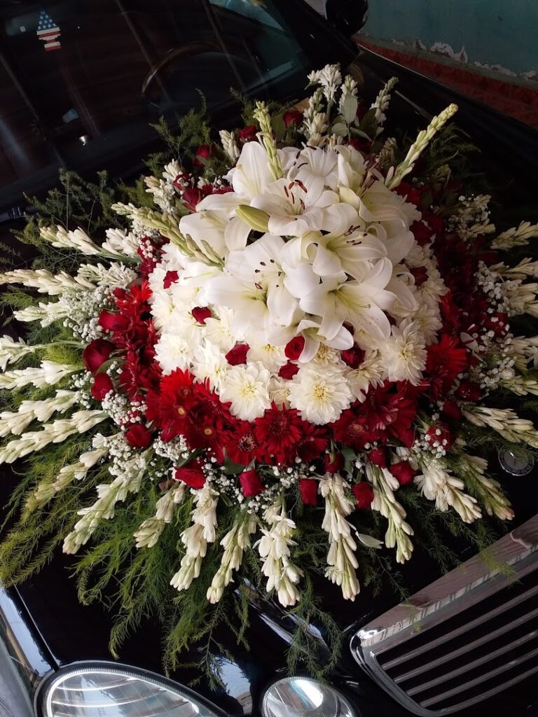 a bouquet of flowers on a black surface