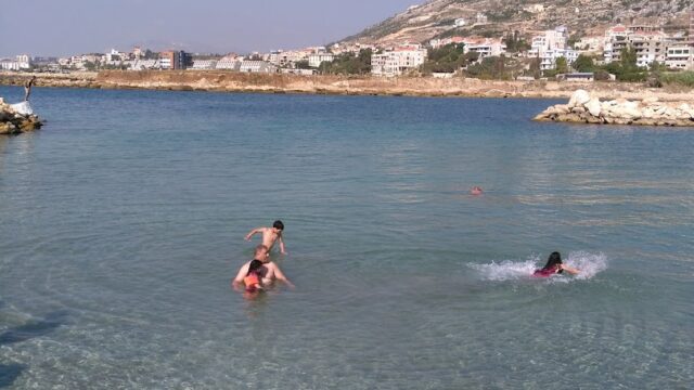 people swimming in the water