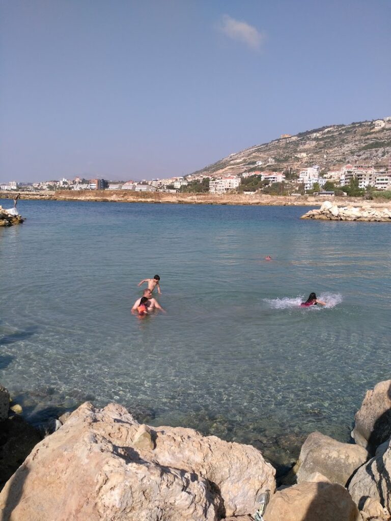 people swimming in the water