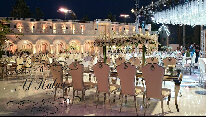 a large white and gold event setting