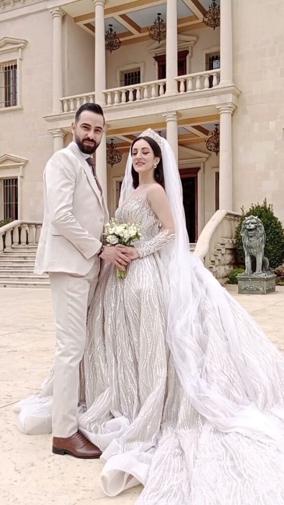 A man and woman in a wedding dress at Al-Nojoom Wedding Center 💫since 2008 💫1st branch kabershmoun 💫2nd branch Queens plaza bouchryieh.