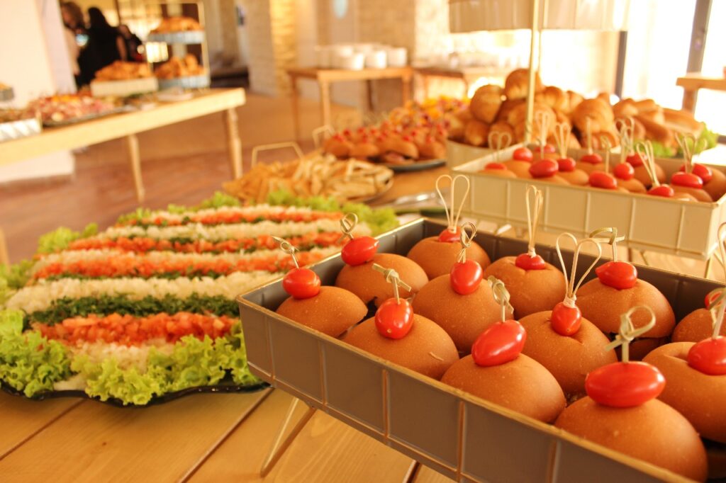 A tray of bread with tomatoes on top, Beitrouna.