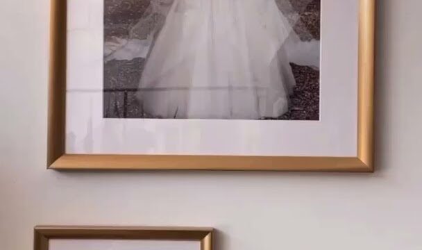 a framed pictures of a woman in a wedding dress