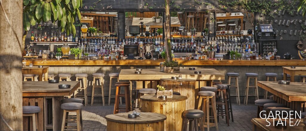 a bar with tables and chairs