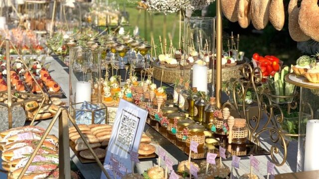 A table full of "Kaakat Gourmet" food.