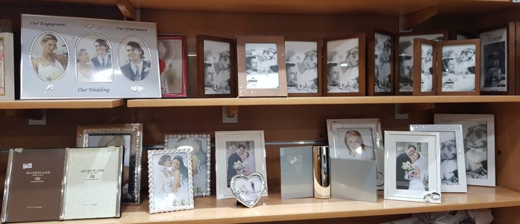 a shelf with pictures on it
