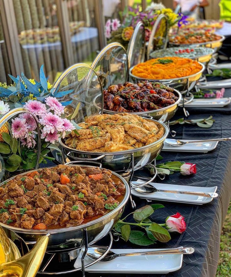 a buffet table full of food at MHeventslb.