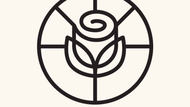 a logo with a rose in a circle