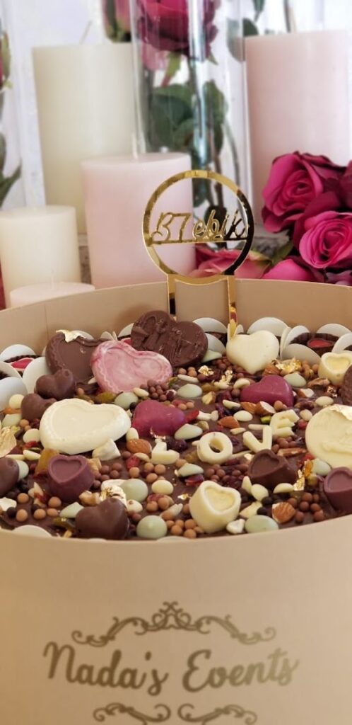 a box of chocolate hearts and nuts