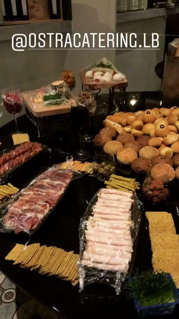 "A table full of food catered by Ostra Catering."