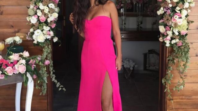 a woman in a pink dress