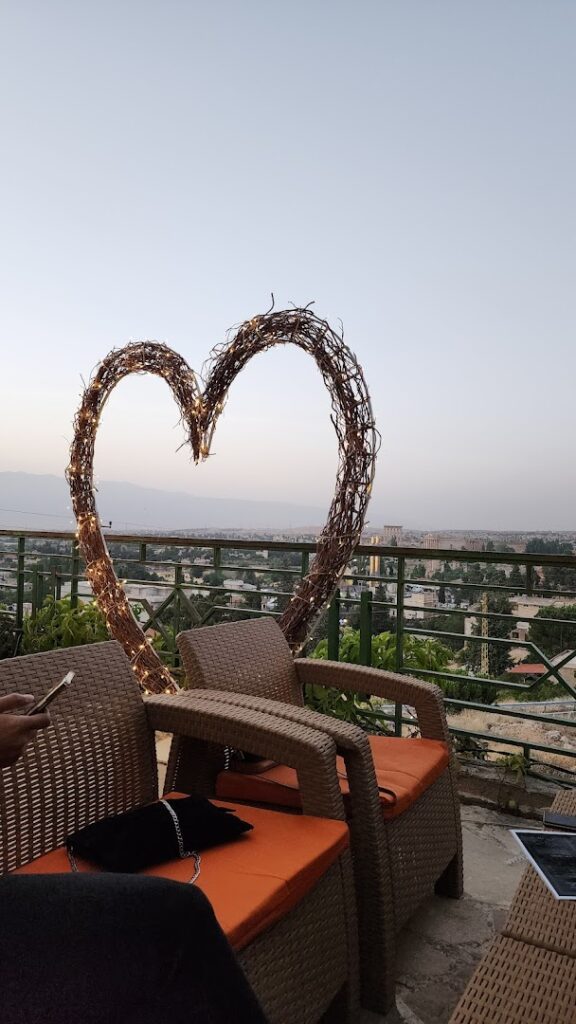 "A heart shaped light sculpture on the Terrace Baalbeck balcony."