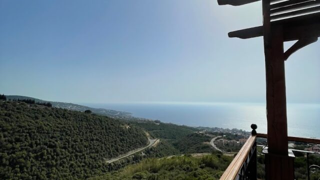 a balcony overlooking a body of water