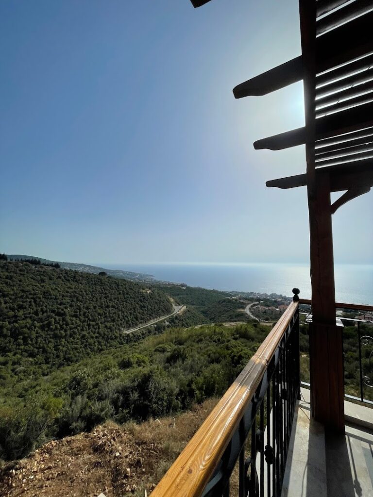 a balcony overlooking a body of water