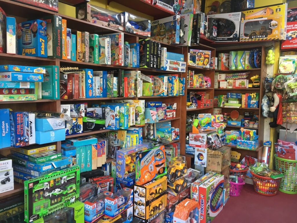 A shelves full of toys showcasing the art of fireworks.